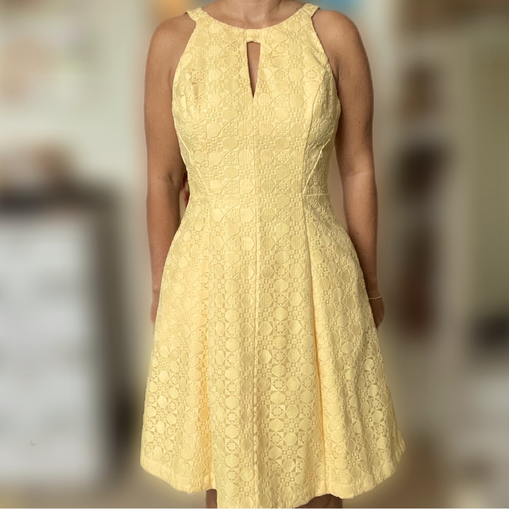 New with Tags WHBM Yellow Sleeveless Keyhole Fully lined dress with pockets.